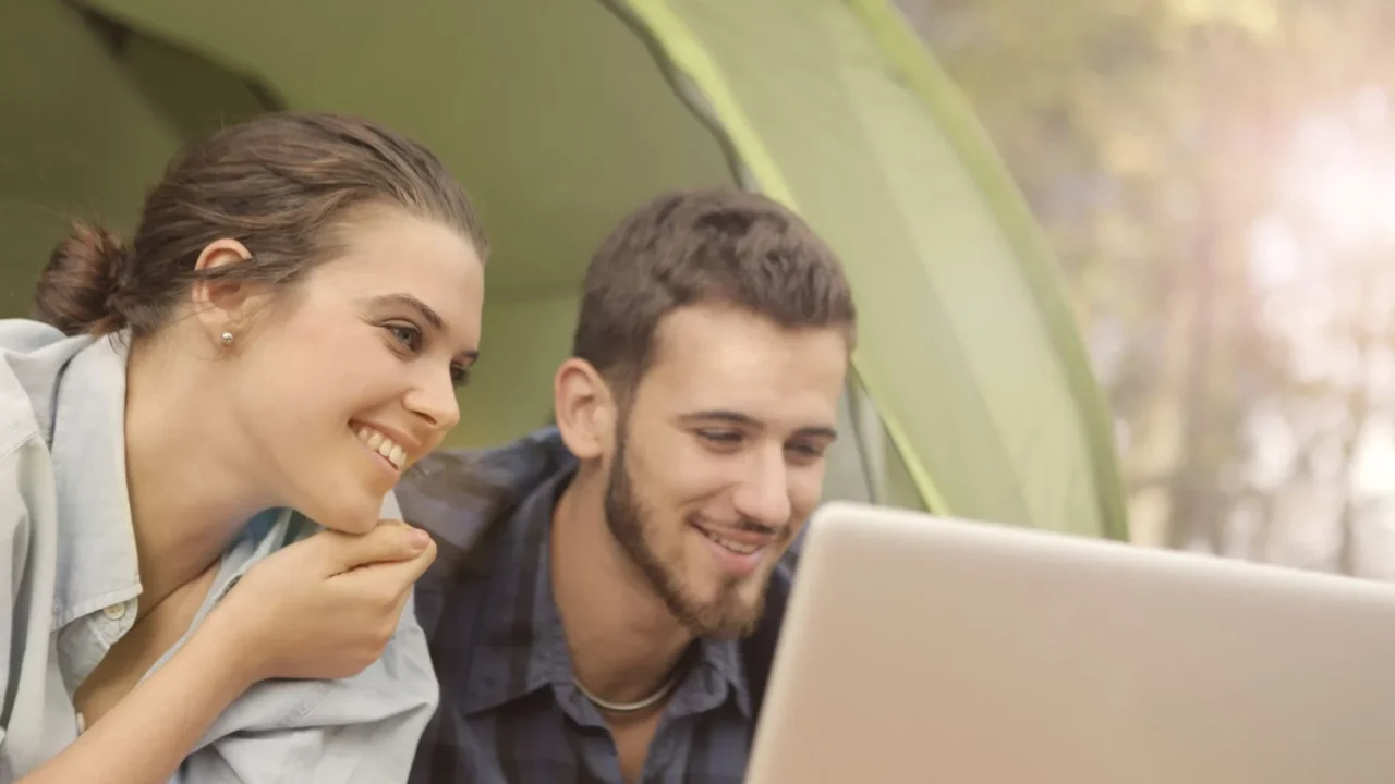 Happy Couple Laptop Benefits